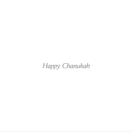 Inside of card displaying the text 'Happy Chanukah'